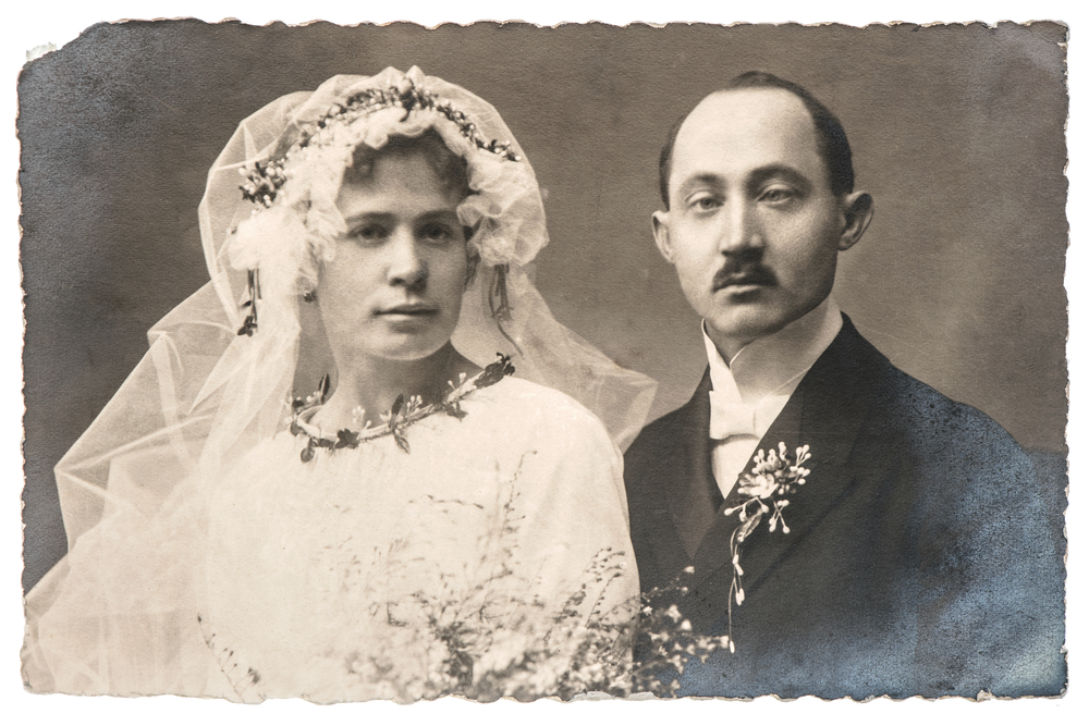 GERMANY, BERLIN- CIRCA 1920: vintage wedding photo. just married couple. nostalgic picture with original film grain and scratches